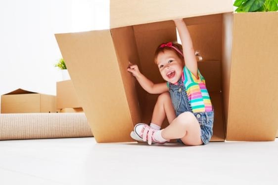 Child playing in box